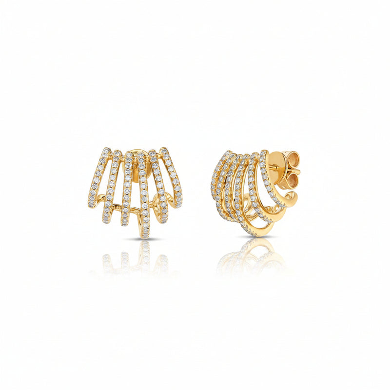 A pair of gold huggie hoop earrings adorned with pavé-set clear stones, shown from both front and side angles on a white background with a faint diagonal watermark pattern.