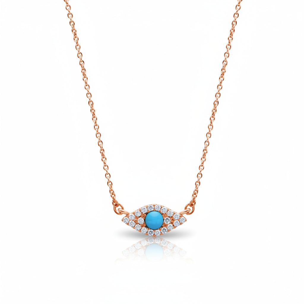 A rose gold necklace with an evil eye pendant featuring a central turquoise blue stone surrounded by small clear stones, shown on a white background with a faint watermark pattern.