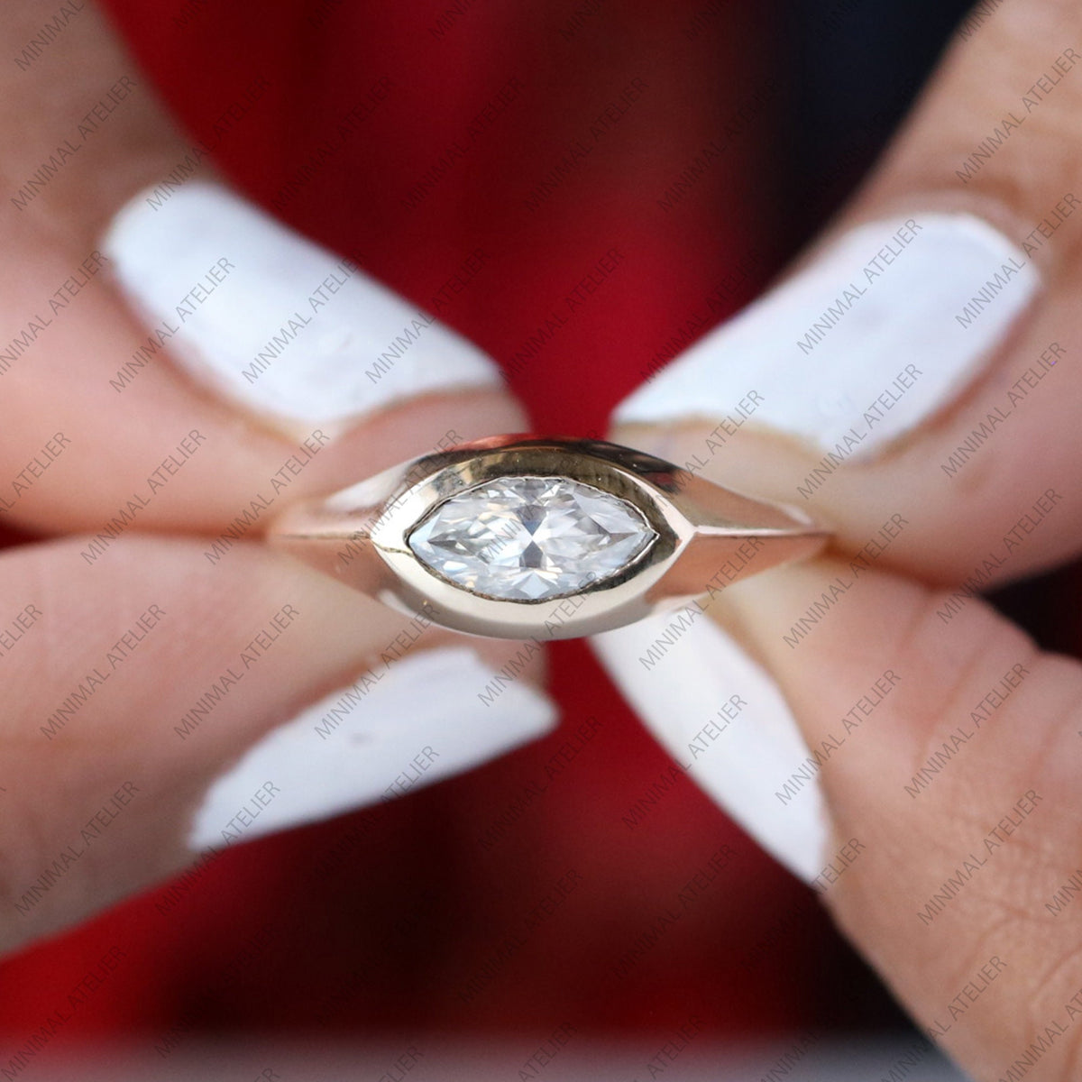 East West Marquise Moissanite Ring