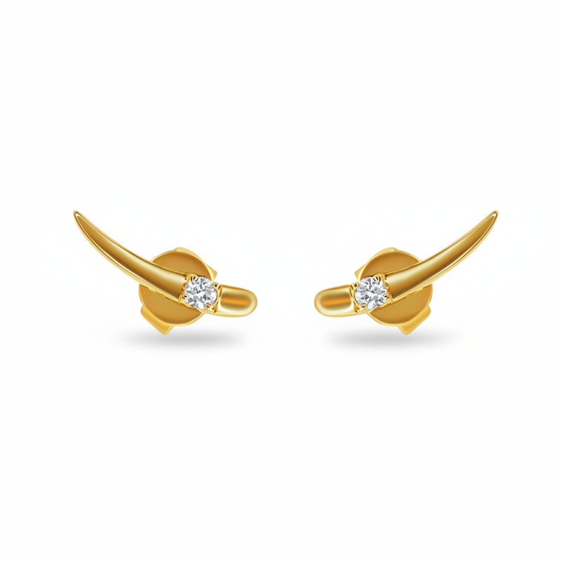 A pair of gold-toned stud earrings with curved horn-like shapes and a small clear gemstone at the center, shown on a white background with a faint repeating watermark.
