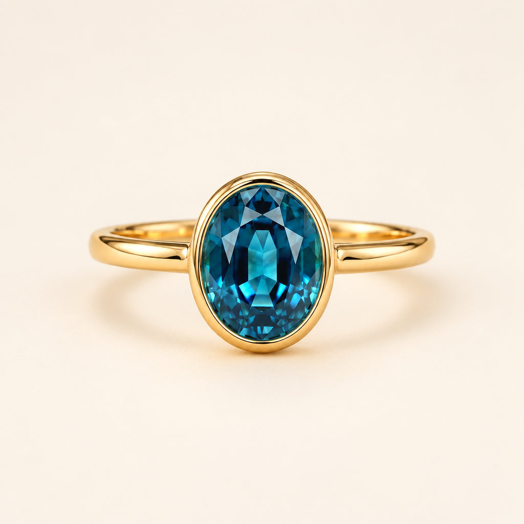 Lab-Created Oval Teal Sapphire Bezel Solitaire Ring