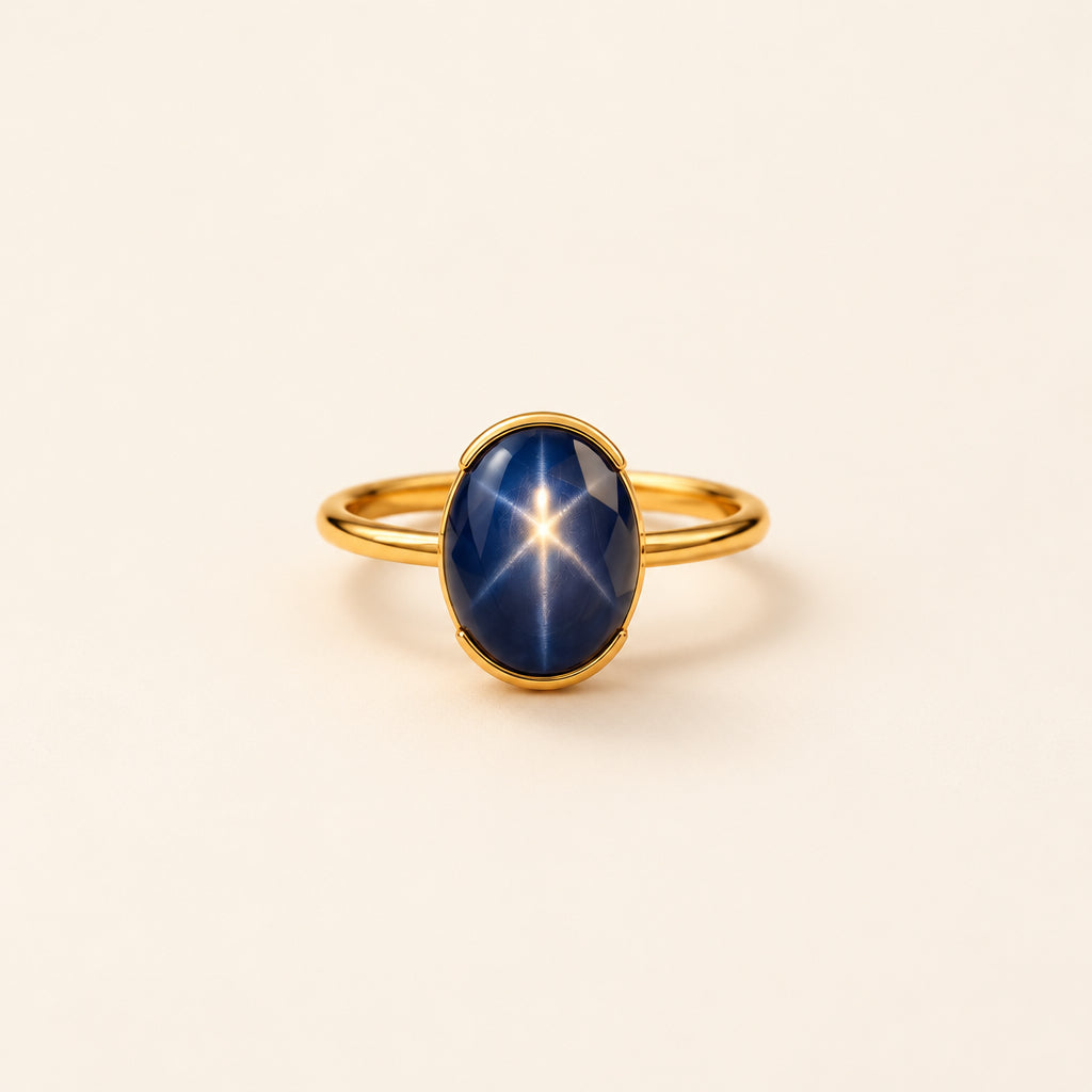 Blue Oval Star-Effect Bezel Ring