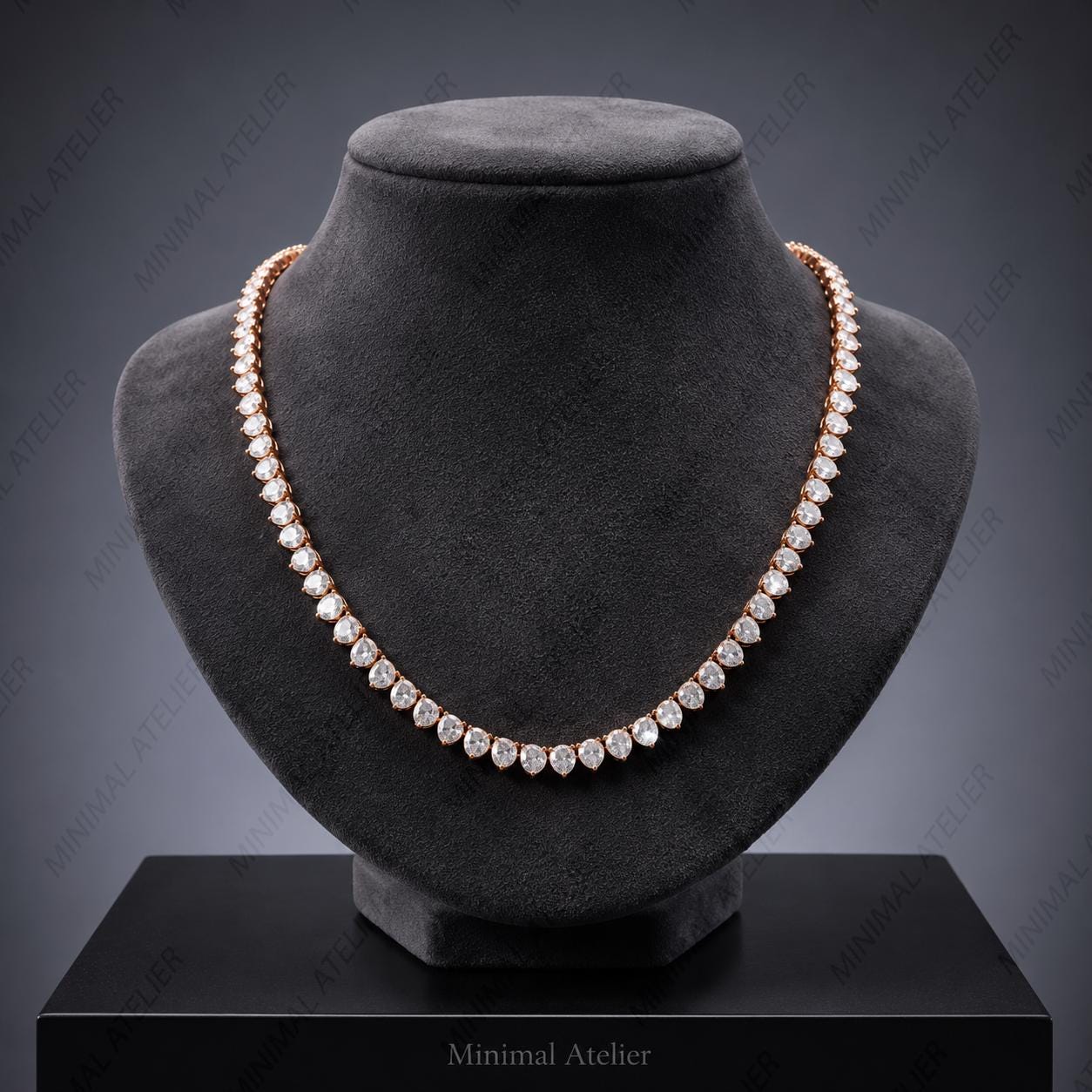 A double-row diamond tennis necklace in rose gold, displayed on a black velvet jewelry bust against a dark gray gradient background.